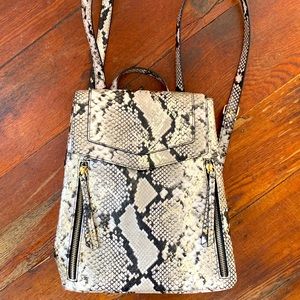 Snake skin back pack style purse